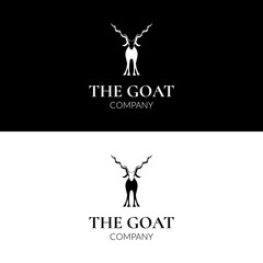 Goat with long horn standing tall for livestock milk and farm logo design in silhouette style