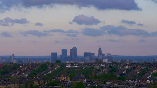 Canary Wharf Skyline Time Lapse Day Time Clouds Rushing Past Trees Houses Building Skyscrapers