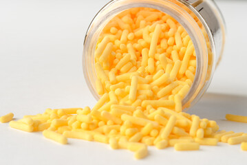 Yellow Sprinkles Spilled from a Jar