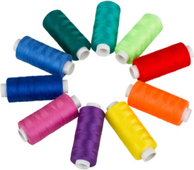 Spools of colorful thread isolated on white