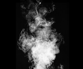 Abstract smoke texture over black background. Fog in the darkness.