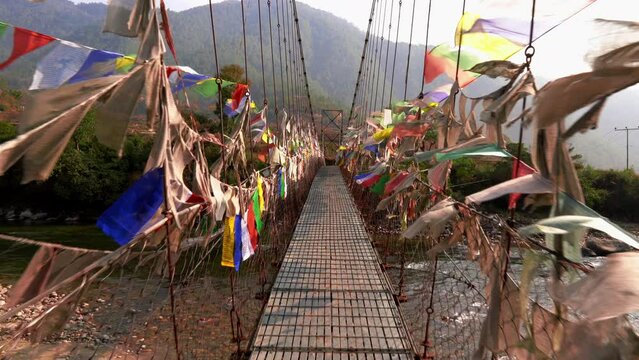Walking on the Punakha Suspension Bridge in Bhutan