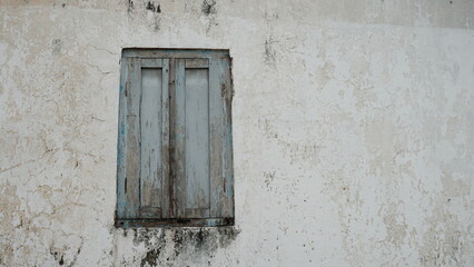 old wooden window on the wall with copy space