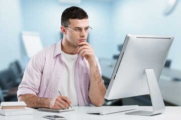 Fototapeta premium Modern Office Businessman or Manager Working on Computer,. Portrait of Successful IT Software Engineer
