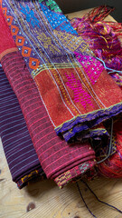Pile of colorful handmade woven fabric of Batak. Traditional ethnic fabric of Indonesia