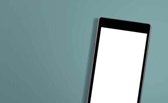 Blank screen on smartphone on color desk