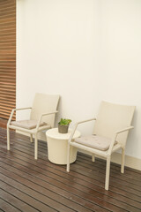 comfortable pillows on wicker chair