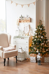 Winter holidays and vacations. Christmas and New Year decor background. Christmas tree and toys. Nursery Christmas decoration. Children's room interior