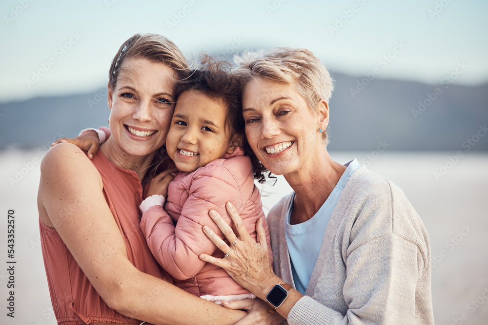 Wall mural Happy family generation, beach hug and portrait of grandmother, mother and adoption child bonding, relax and enjoy quality time together. Winter peace, freedom and family love of grandma, mom and kid