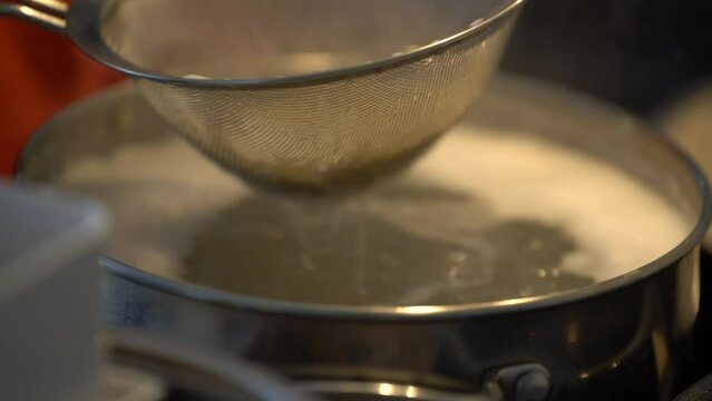 Making Slovakia national food at home, delicious halusky scooped out of pot