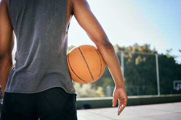 Basketball, motivation and man holding ball on outdoor court, ready to play game, match and...
