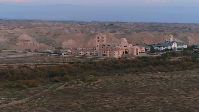 Aerial view over Qasr al-Yahud or The land of the monasteries
Qasr al-Yahud is the western section of the traditional site of the baptism of Jesus by John the Baptist on the Jordan River, drone view, 