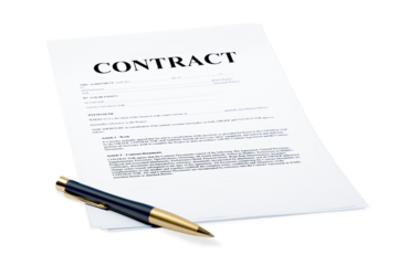 Ballpoint pen on top of a financial contract