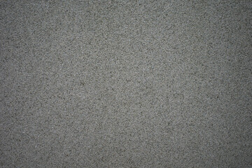 Gray granite background. Texture of solid granite tiles.
