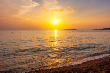Scenic summer sunset on a beach