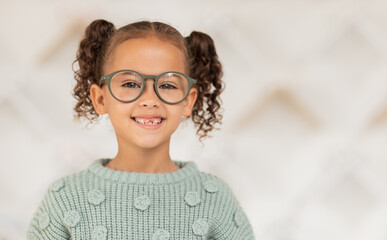 Kid, girl or face vision glasses in optometrist, ophthalmologist or eye exam clinic for eyes healthcare, wellness or support. Portrait, smile or happy child and optometry prescription or fashion lens