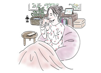 コーヒーを飲む女性　背景あり