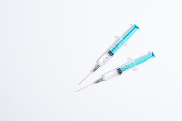 Fototapeta premium Disposable plastic syringe prepared for injection and vaccination in the hospital. The concept of medicine and health