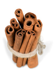 Close-up of cinnamon sticks isolated on white background