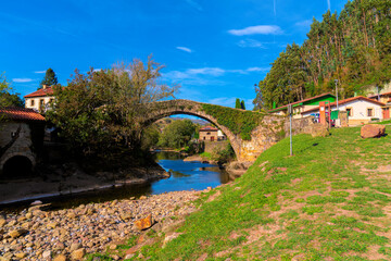 Lierganes Cantabria Spain old roman bridge over River Miera in pretty village located 15 miles from...