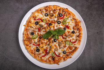 Traditional kebab pizza on a rustic background