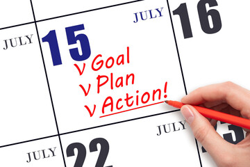 Hand writing text GOAL PLAN ACTION on calendar date July 15. Motivation for a new day. Business...