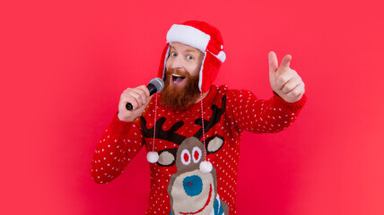 amazed man announcing christmas sale in microphone. merry christmas sale. man announcing sale