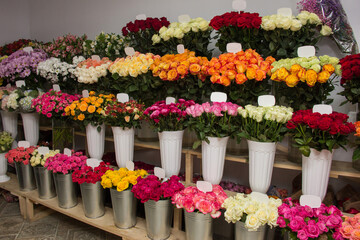 Many flowers in a vase in a flower shop on display