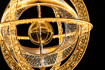 Light decorations in the park. Figures made of Christmas lights that look like gods and planets. An exhibition of decorations from Christmas lights in Poland. © Mateusz Witkowski