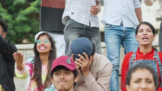 angry crowd or audience scolding to player or umpire while watching sports at stadium - concept of frustration, entertainment and tournament