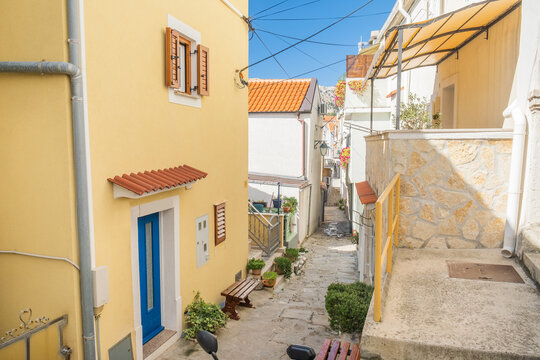 Old street in in historic coastal town of Baska on Krk island in Croatia