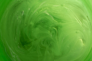 green thick gel background with air bubbles