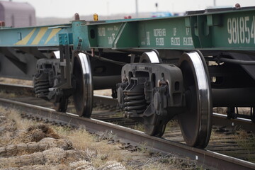Khorgos, Kazakhstan - 09.22.2022 : Wheels of freight trains on the railway tracks. Khorgos Border Station.