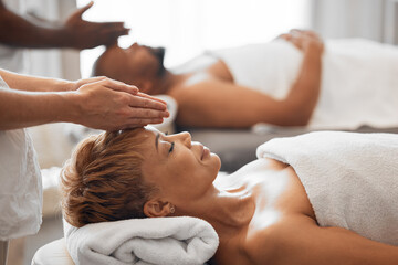 Obraz na płótnie Canvas Woman, head and spa massage of couple at beauty salon, holiday resort and wellness vacation, face cosmetics and peace in Bali. Black woman, luxury facial and relax treatment from skincare therapist
