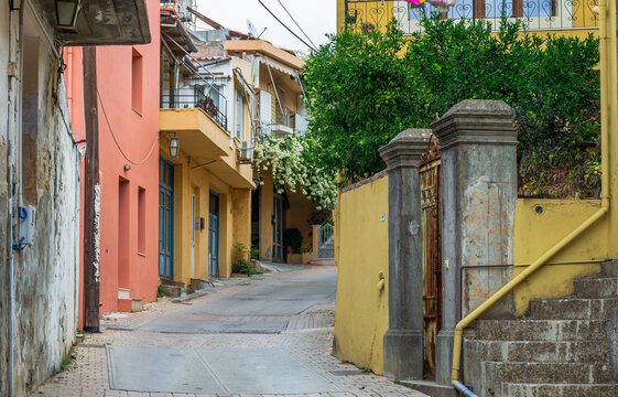 Beautiful alley with colorful buildings in Archanes.