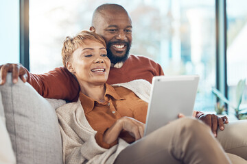 Senior black couple, tablet on sofa or reading social network, email or communication with smile. Mature black woman, happy black man on mobile technology and social media, relax on web app in home