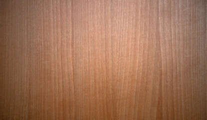 Photo the texture of a dark walnut tree. Wooden table texture background. Laminated wall panel.