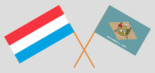 Crossed flags of Luxembourg and The State of Delaware. Official colors. Correct proportion