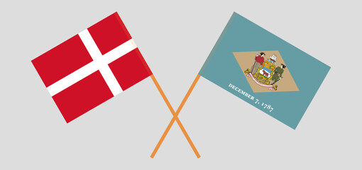 Fototapeta premium Crossed flags of Denmark and The State of Delaware. Official colors. Correct proportion