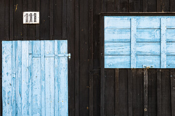 Fototapeta na wymiar blue wooden door