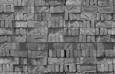 Blotched cracked scratched ancient bumpy wall background. Medieval strong dry loft side fortress fence. Backstein tile in cellar on patio. Solid rough aged brickwall pattern for 3d retro factory decor