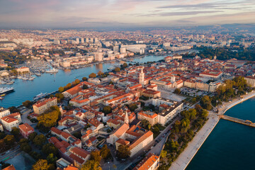 Fototapeta na wymiar City of Zadar archipelago and historic peninsula aerial view in the sunset. Croatian architecture