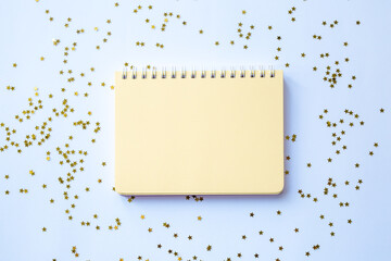 peachy blank notepad on christmas background with sparkles