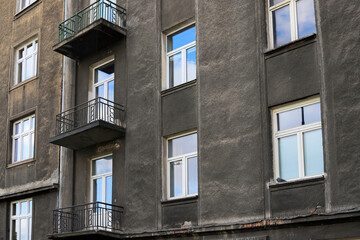 KRAKOW, POLAND - NOVEMBER 02, 2022: Old and dirty facade of tenement.