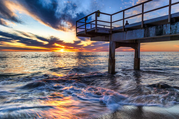 Sunset and motion blur waves, at North Beach, Perth, West Australia