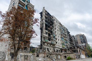 destroyed and burned houses in the city during the war in Ukraine