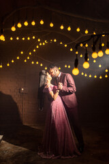 A young Indian couple shooting their pre wedding at a famous studio in Delhi India. Romantic couple...