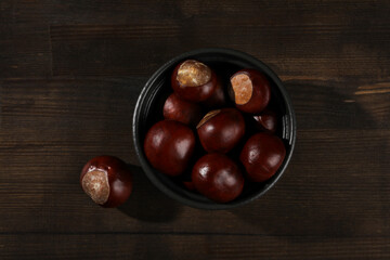 Fresh and ripe chestnuts, top view, Autumn chestnuts