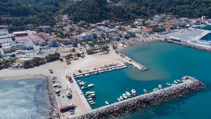 Small yacht port seen from aerial drone view in the Aegean island of Samos