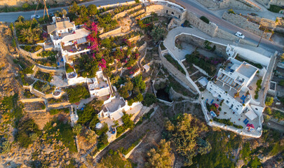 Top view of beautiful Greek architecture buildings on the shore of the Aegean Sea 
